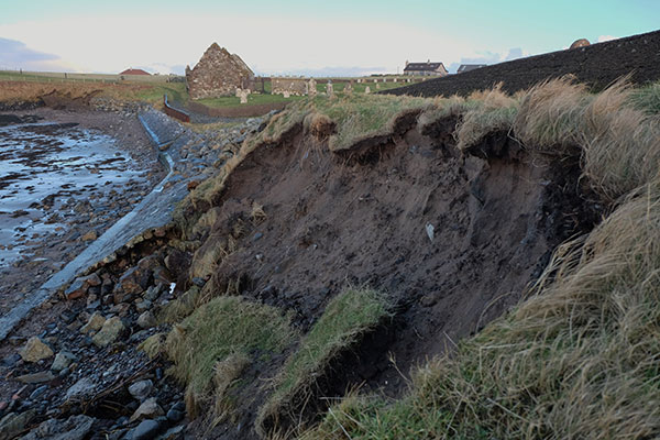 Erosion to the sea wall at Ui Church.